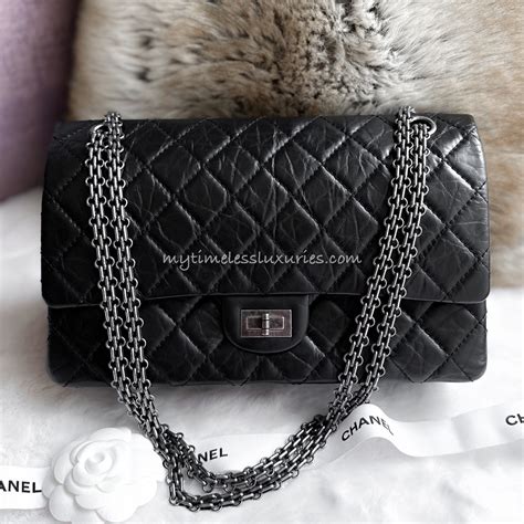 chanel reissue black gold 226|Chanel reissue bag.